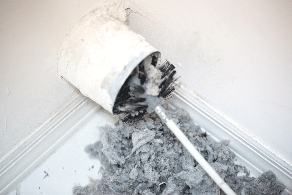 GettyImages-LA.497609526.cleaning.dryer_.vent_.web_